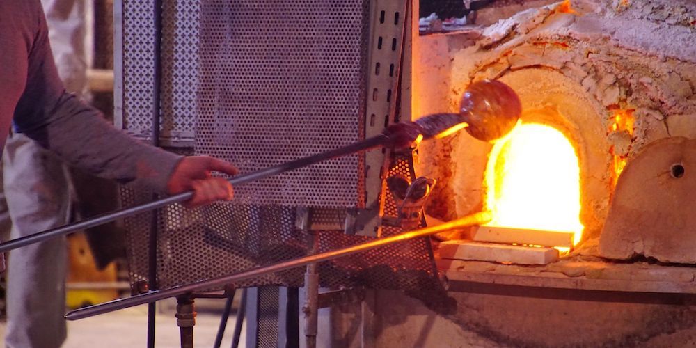 20250714000551-murano-vs-burano-murano-glassblower.jpg